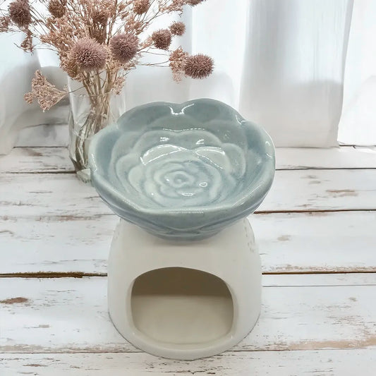 Difusor cerámico floral Eternaluz en dos tonos con base blanca y flor en rosado, celeste o gris