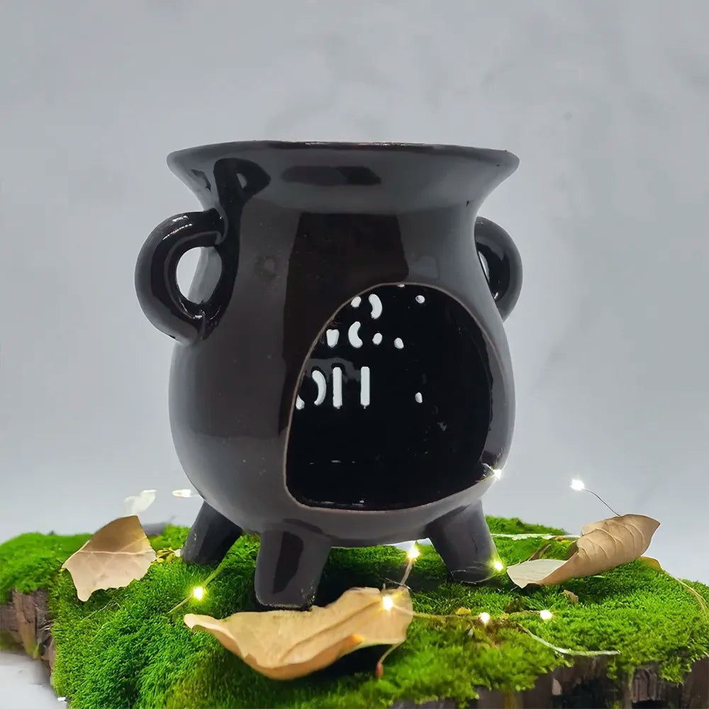 Difusor cerámico Sweet Home de Eternaluz en color blanco y negro con vela de té