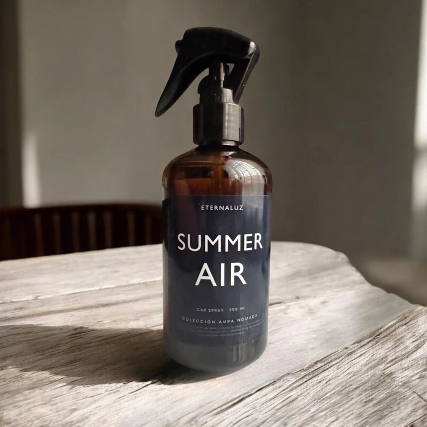 Car Spray Eternaluz Summer Air con aroma tropical fresco, colección Aura Nómada.