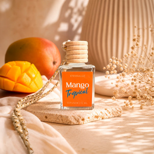 Difusor de Auto Eternaluz Mango Tropical con aroma a mango, piña y frambuesa, colección Aura Nómada.