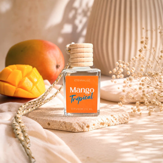 Difusor de Auto Eternaluz Mango Tropical con aroma a mango, piña y frambuesa, colección Aura Nómada.