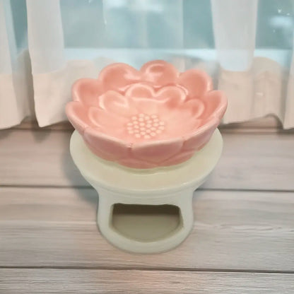 Difusor cerámico en forma de flor Eternaluz en tonos blanco y rosa, ideal para wax melts o aromaterapia