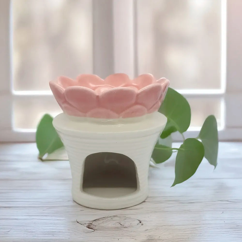Difusor cerámico en forma de flor Eternaluz en tonos blanco y rosa, ideal para wax melts o aromaterapia