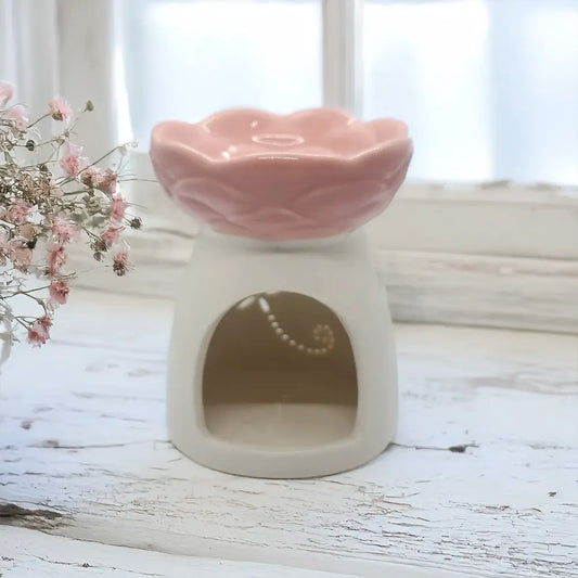 Difusor cerámico floral Eternaluz en dos tonos con base blanca y flor en rosado, celeste o gris