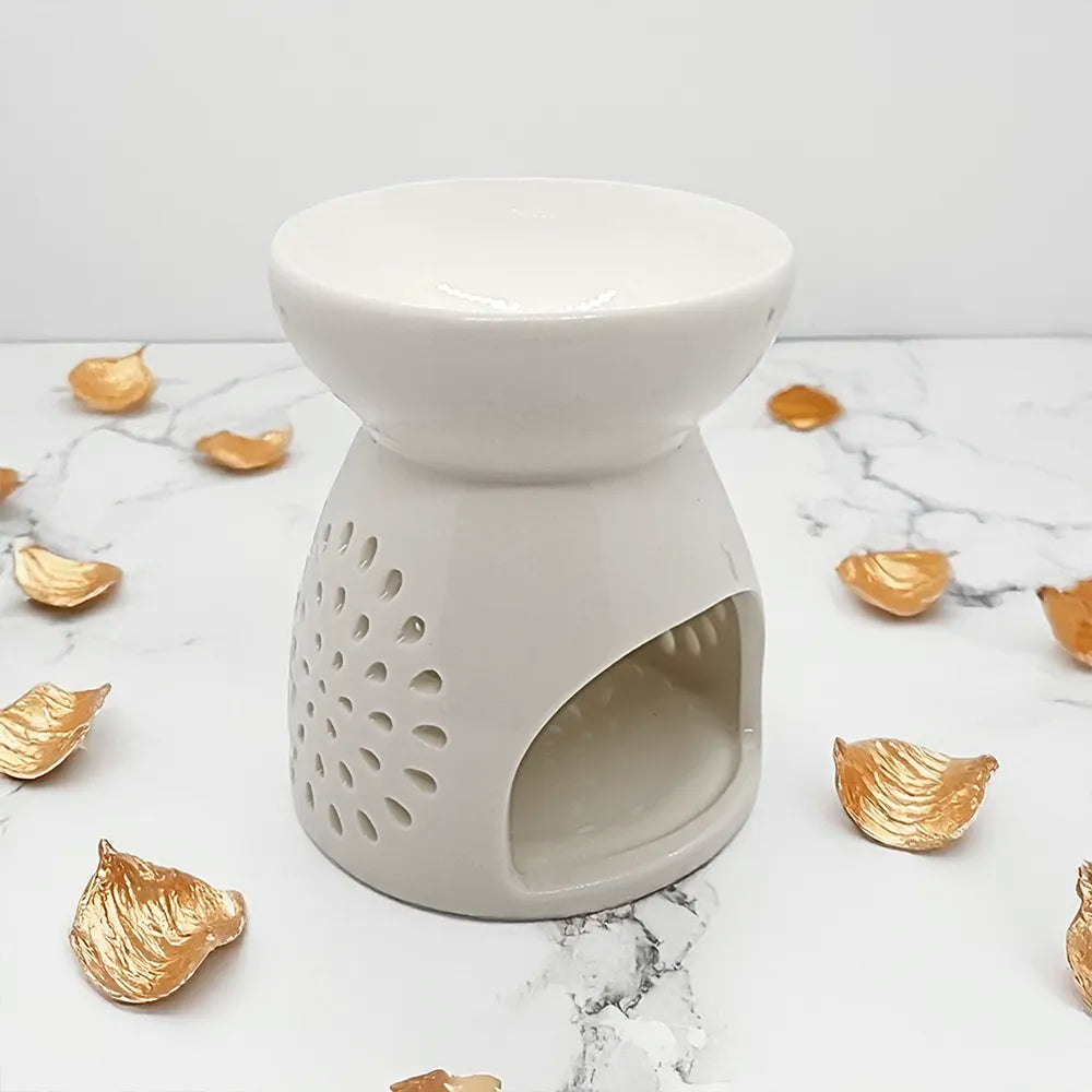 Difusor Luz de Luna en cerámica blanca con cortes decorativos, ideal para wax melts o aromaterapia.