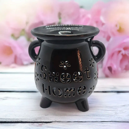 Difusor cerámico Sweet Home de Eternaluz en color blanco y negro con vela de té