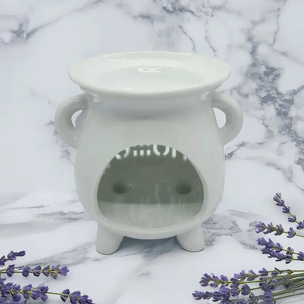 Difusor cerámico Sweet Home de Eternaluz en color blanco y negro con vela de té