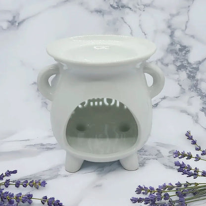 Difusor cerámico Sweet Home de Eternaluz en color blanco y negro con vela de té