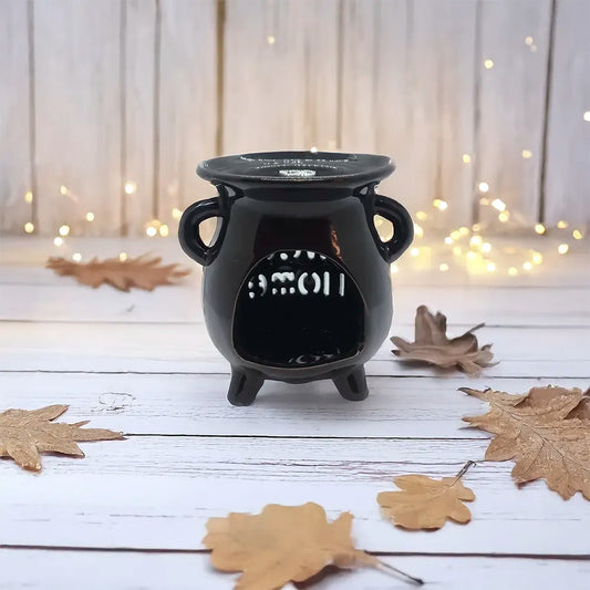 Difusor cerámico Sweet Home de Eternaluz en color blanco y negro con vela de té