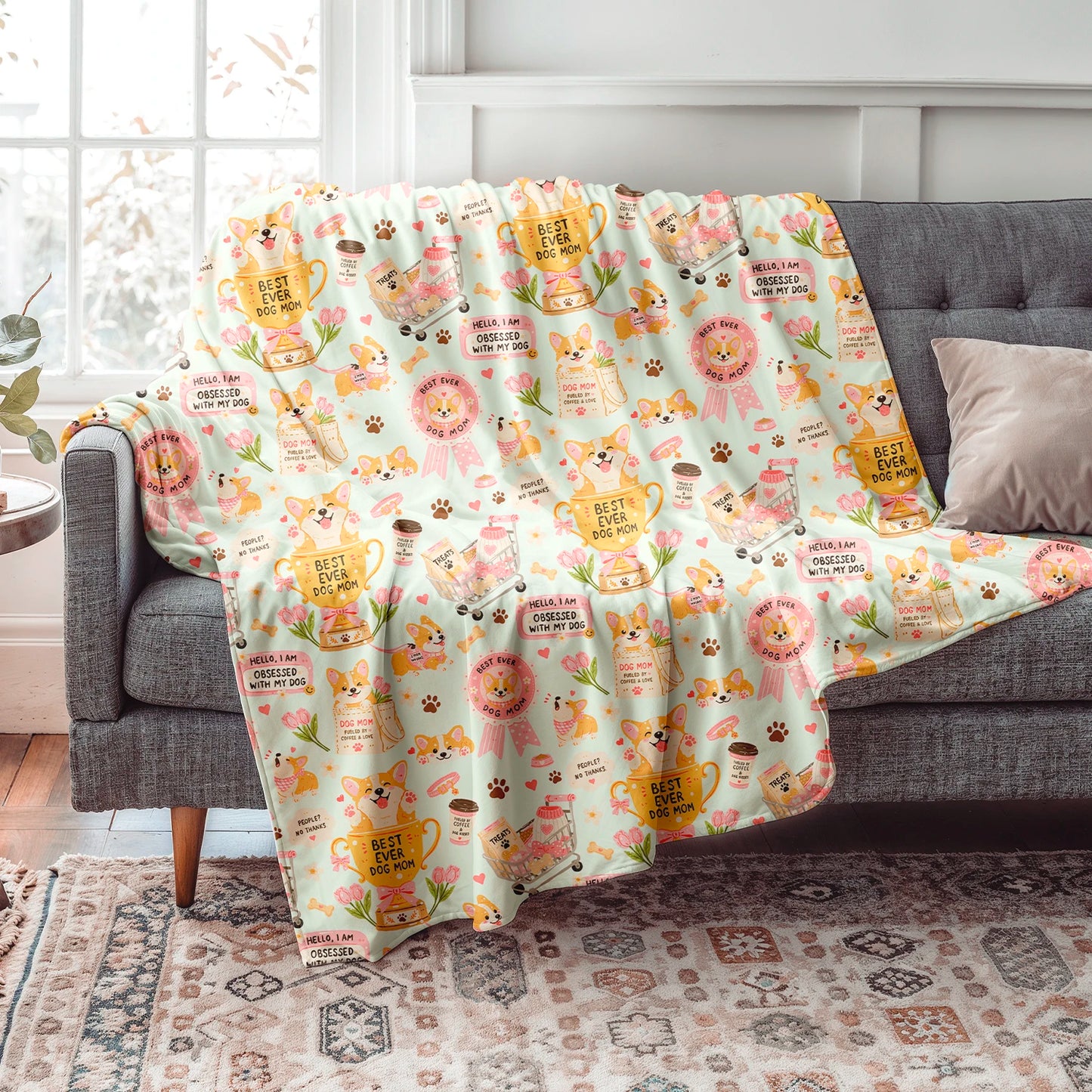 Manta de invierno para amantes de los perros con diseño de perritos, huellas, premios y detalles inspirados en mamás perrunas, confeccionada en felpa con reverso sherpa blanco.