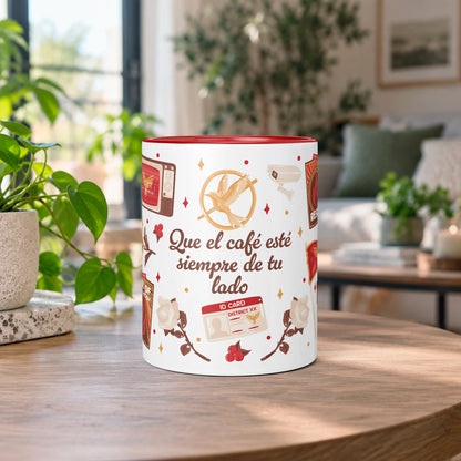 Taza sublimada de cerámica 11 oz Sinsajo, inspirada en Los Juegos del Hambre, con asa e interior rojo, arco, flecha, símbolos de rebelión y detalles rojos.