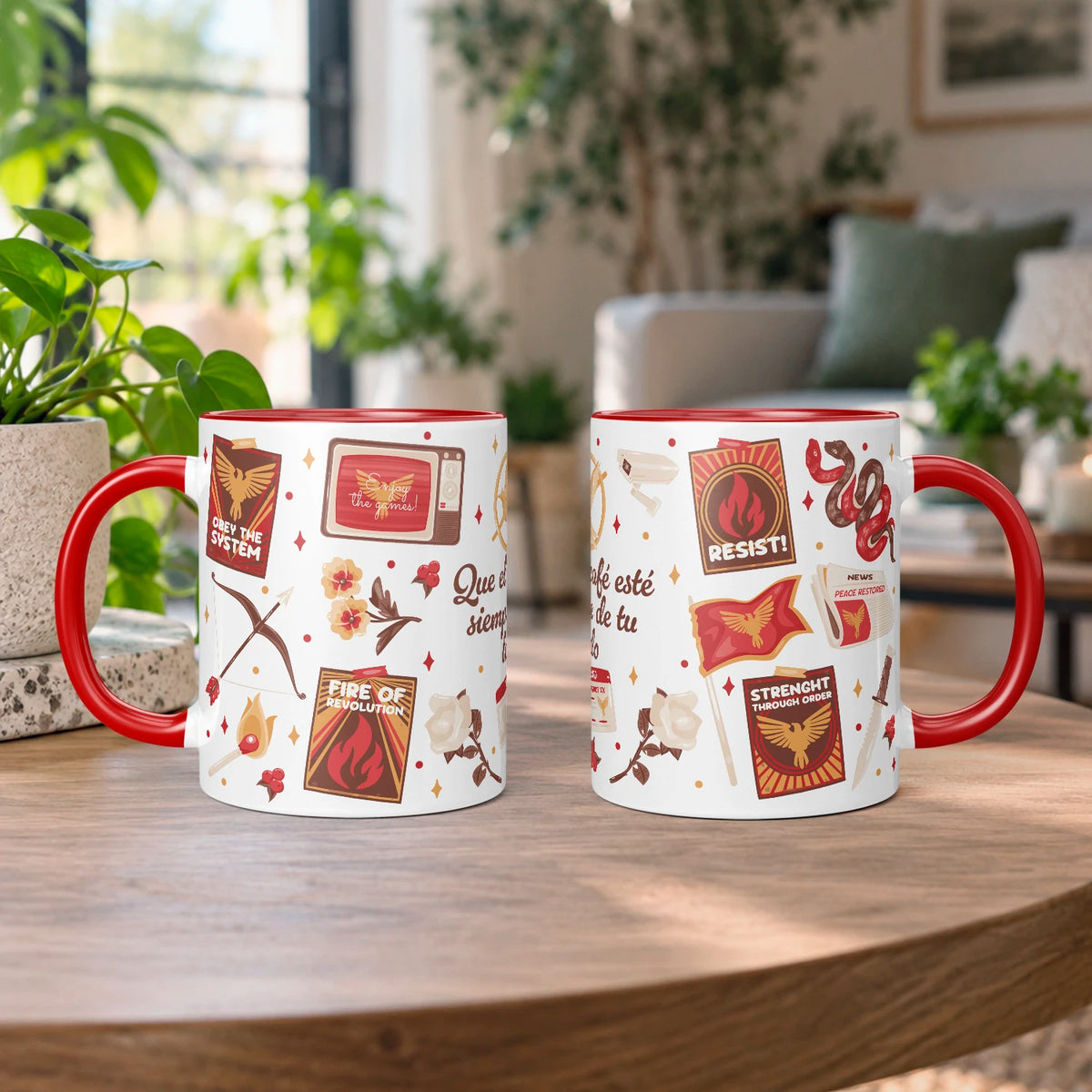 Taza sublimada de cerámica 11 oz Sinsajo, inspirada en Los Juegos del Hambre, con asa e interior rojo, arco, flecha, símbolos de rebelión y detalles rojos.