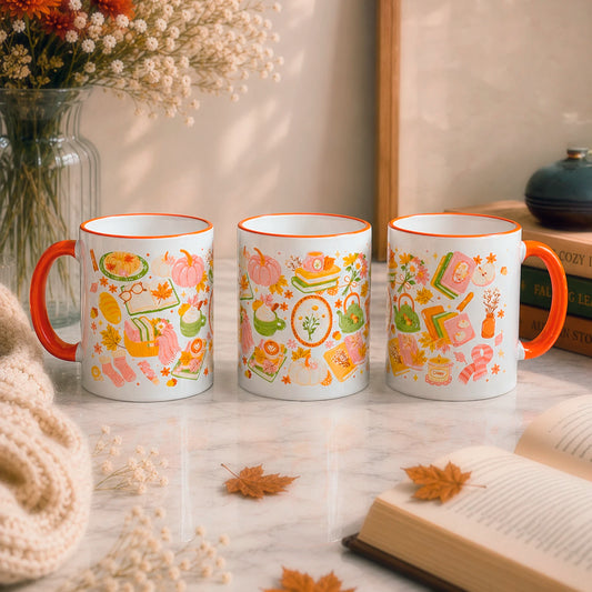 Taza sublimada de cerámica 11 oz Tarde de Otoño con diseño cozy de libros, hojas otoñales, calabazas, flores y té.